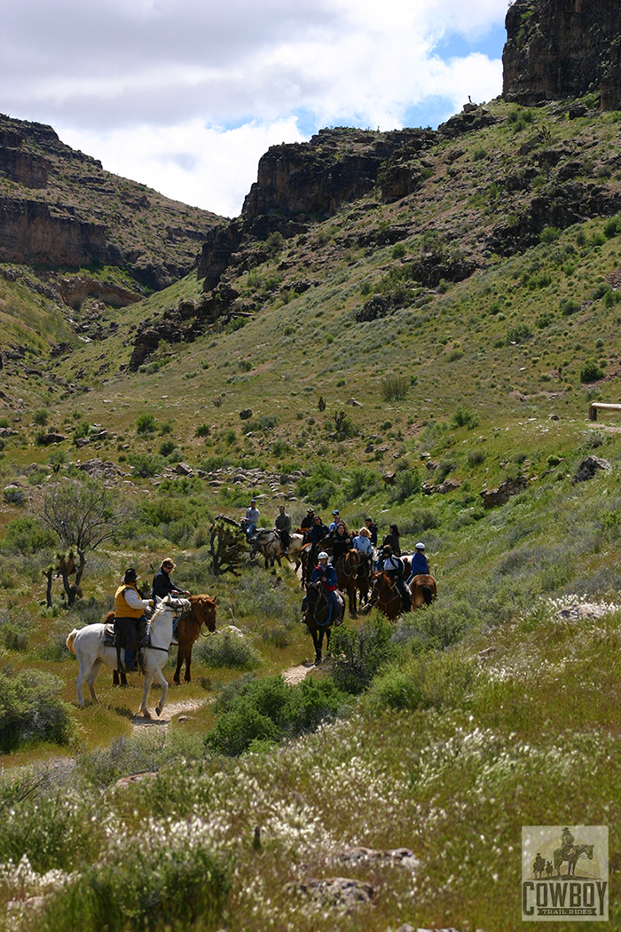 Riders enjoying a spring morning while Horseback Riding in Las Vegas at Cowboy Trail Rides in Red Rock Canyon